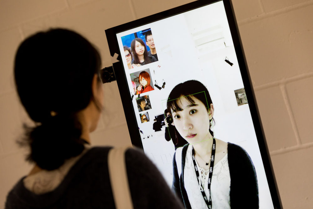 A user searches for their identity in the MegaFace dataset at Glass Room exhibition in London. Photo ©  Tactical Tech.